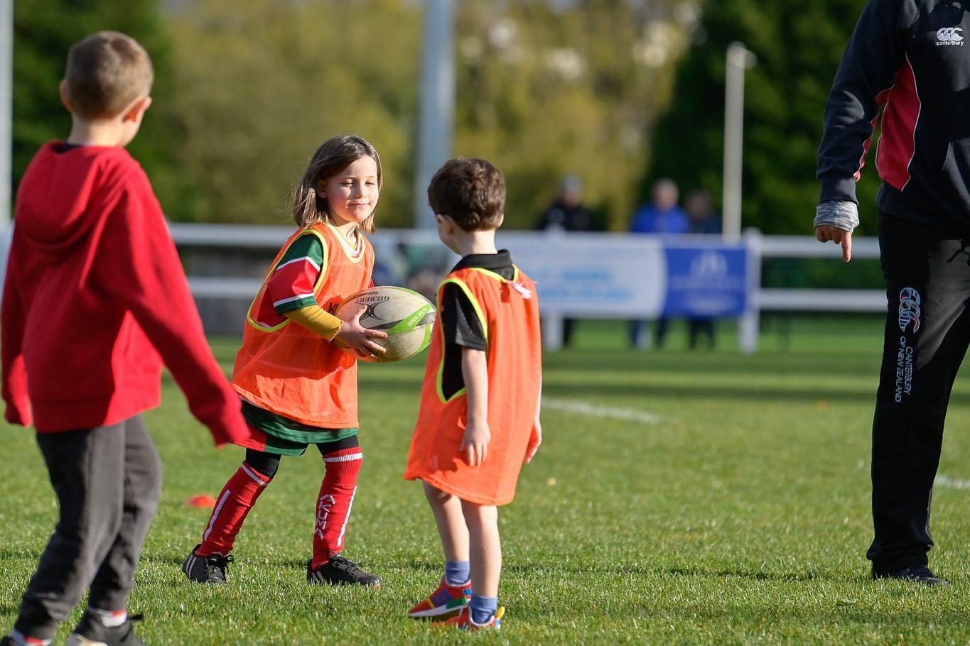 GHA minis players and parents on the touchline at Braidholm
