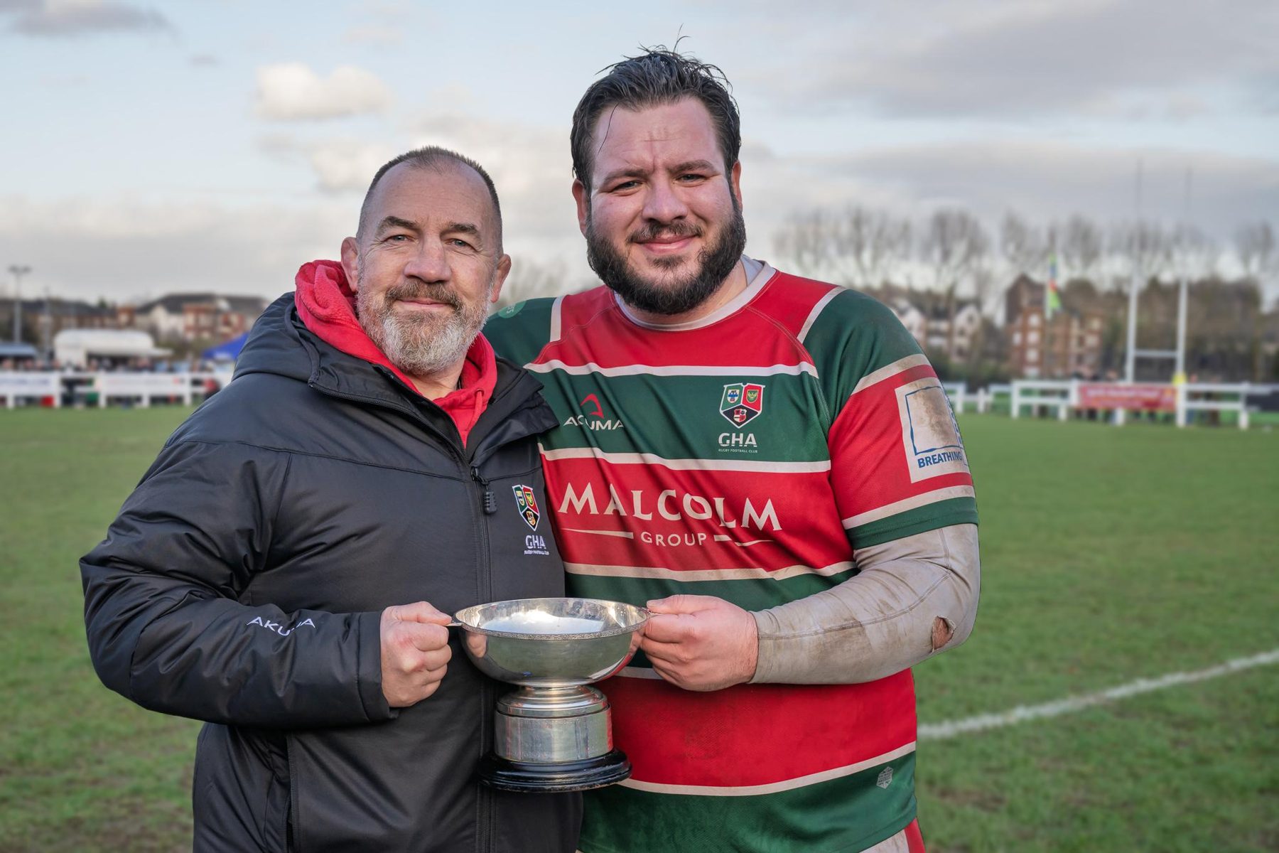 GHA coaches with a trophy at Braidholm